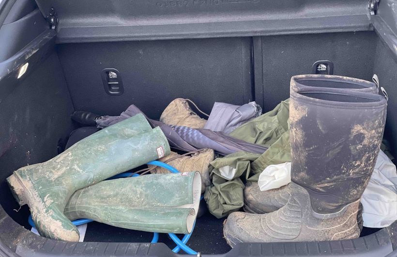 Mazda MX-30 luggage area, filled with muddy boots